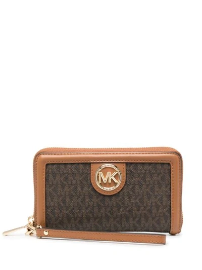 Shop Michael Michael Kors Logo Print Zip-up Purse In Brown