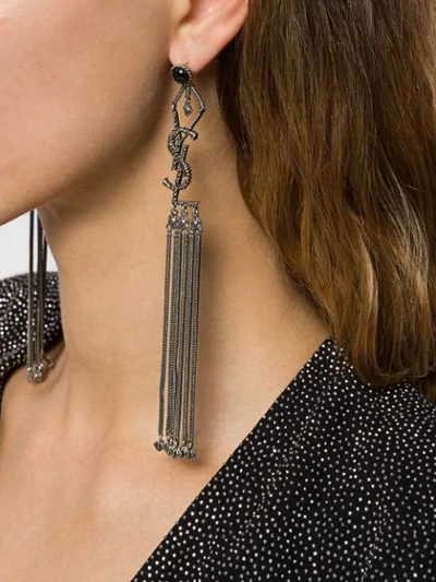 Shop Saint Laurent Monogram Textured Tassel Earrings In Metallic