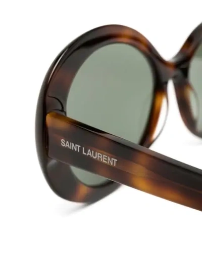 Shop Saint Laurent Round Frame Sunglasses In Brown