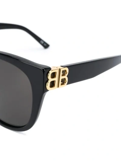 Shop Balenciaga Cat-eye Tinted Bb Sunglasses In Black
