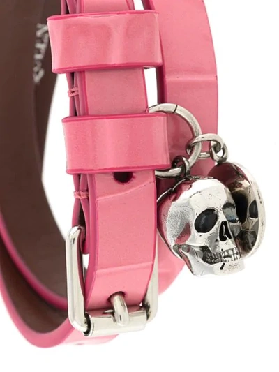 Shop Alexander Mcqueen Embossed-skull Charm Bracelet In Pink