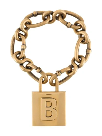 Shop Balenciaga Lock Chain Bracelet In Gold