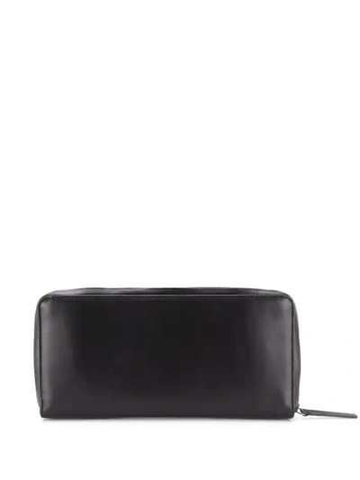 Shop Ann Demeulemeester Embossed Logo Zip-around Wallet In Black