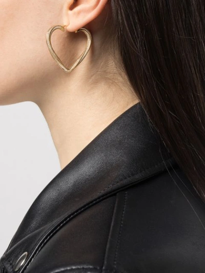 Shop Saint Laurent Crystal Heart Earrings In Gold