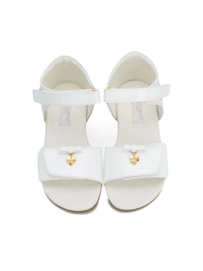 Shop Dolce & Gabbana Bow Heart Sandals In White