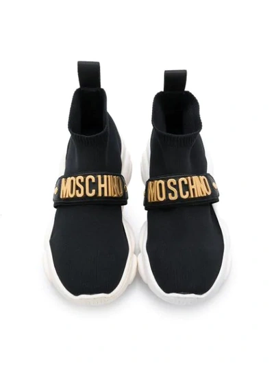Shop Moschino Teen Logo Strap Sock Sneakers In Black