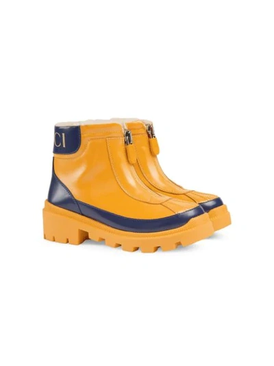 Shop Gucci Children's Leather Boot With Faux Fur Lining In Yellow