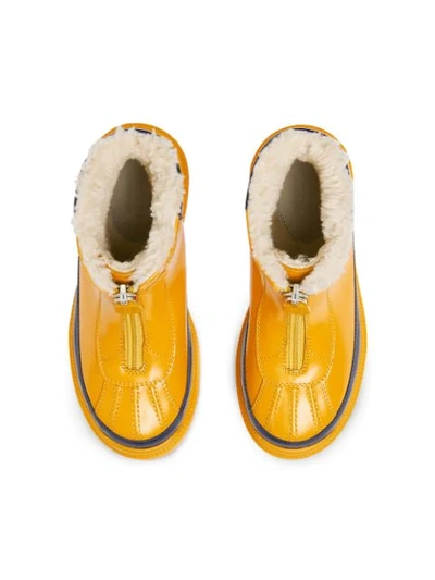 Shop Gucci Children's Leather Boot With Faux Fur Lining In Yellow