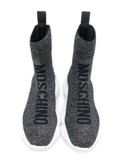 Shop Moschino Logo Print Sock Trainers In Black