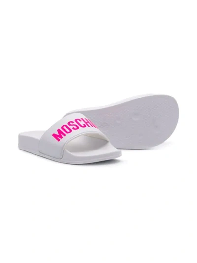 Shop Moschino Logo Printed Slides In White