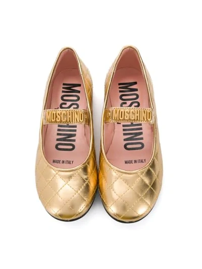 Shop Moschino Quilted Metallic Ballerinas In Gold