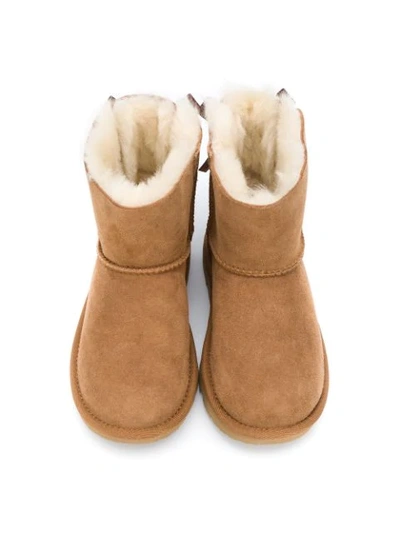 Shop Ugg Shearling Bow-detail Boots In Brown