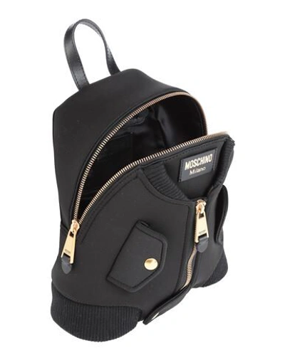 Shop Moschino Backpacks & Fanny Packs In Black