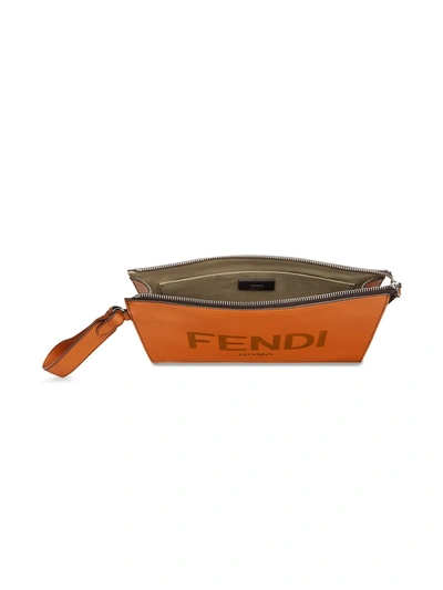 Shop Fendi Debossed-logo Wrist Strap Pouch In Brown