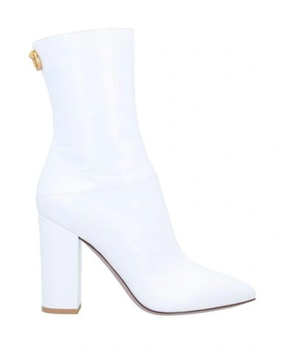 Shop Valentino Ankle Boots In White