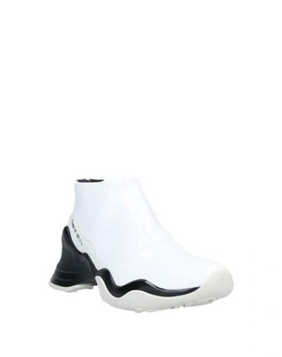 Shop Fendi Sneakers In White