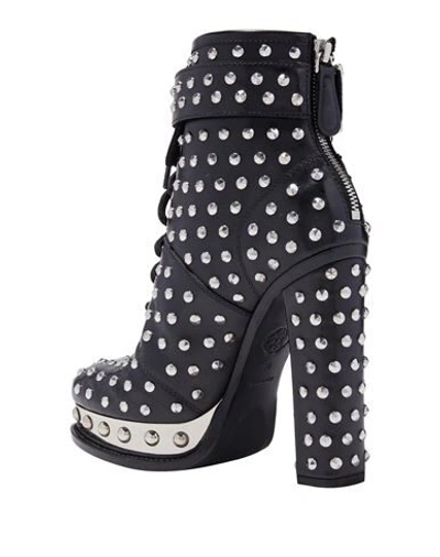 Shop Alexander Mcqueen Ankle Boots In Black