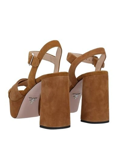 Shop Prada Sandals In Camel