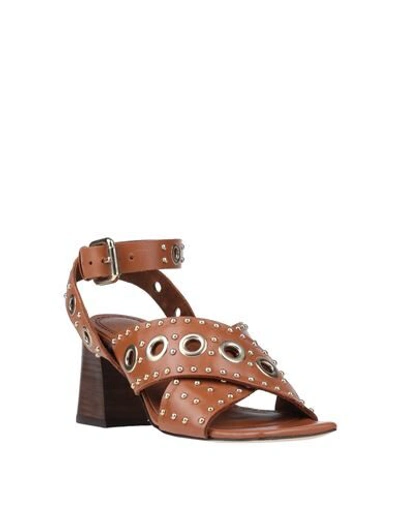 Maje Ferma Eyelet-embellished Leather Sandals In Brown
