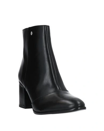 Shop Armani Exchange Ankle Boots In Black