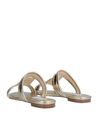 Tod's Metallic Textured-leather Slides In Gold