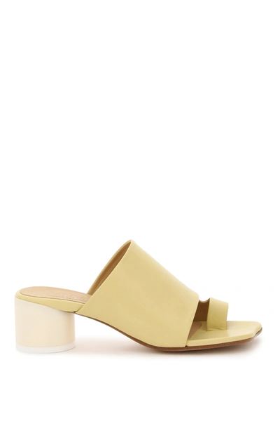 Shop Mm6 Maison Margiela Mules With Cylinder Heel In Limelight (yellow)