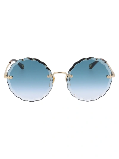 Shop Chloé Ch0047s Sunglasses In 002 Gold Gold Blue