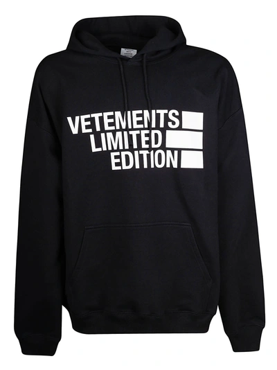 Shop Vetements Logo Print Hoodie In Black