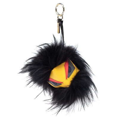 Pre-owned Fendi Yellow Fur And Leather Eyes Bug Bag Charm In Black