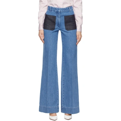 Shop Victoria Beckham Blue Patch Pocket Jeans In 6934 70swsh