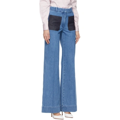 Shop Victoria Beckham Blue Patch Pocket Jeans In 6934 70swsh