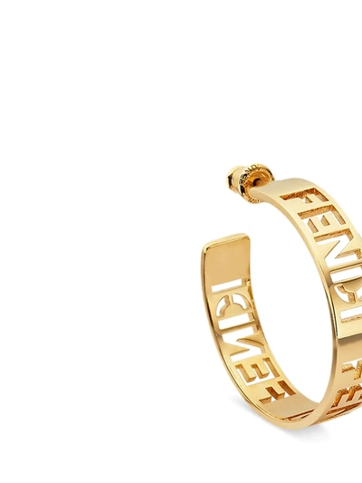 Shop Fendi Logo Cut-out Hoop Earrings In Gold