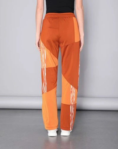 Shop Adidas Originals By Danielle Cathari Pants In Orange