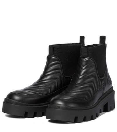 Shop Gucci Quilted Leather Platform Ankle Boots In Black