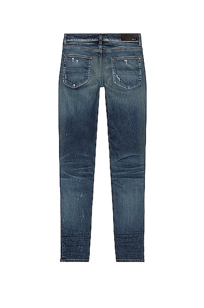 Shop Amiri Slash Jean In Deep Classic