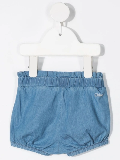 Shop Chloé Bow-detail Denim Shorts In Blue