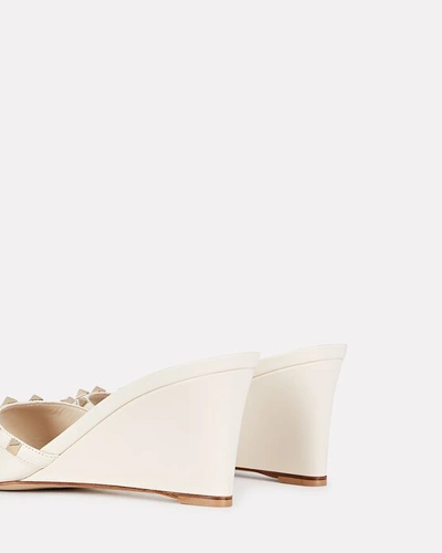 Shop Valentino Rockstud Leather Wedge Sandals In Ivory