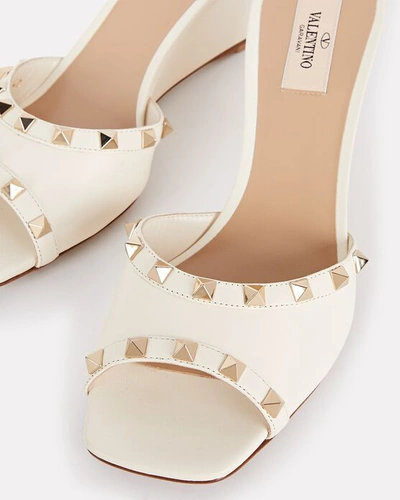 Shop Valentino Rockstud Leather Wedge Sandals In Ivory