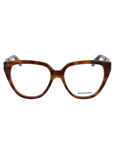 Shop Balenciaga Bb0129o Glasses In 002 Havana Havana Transparent