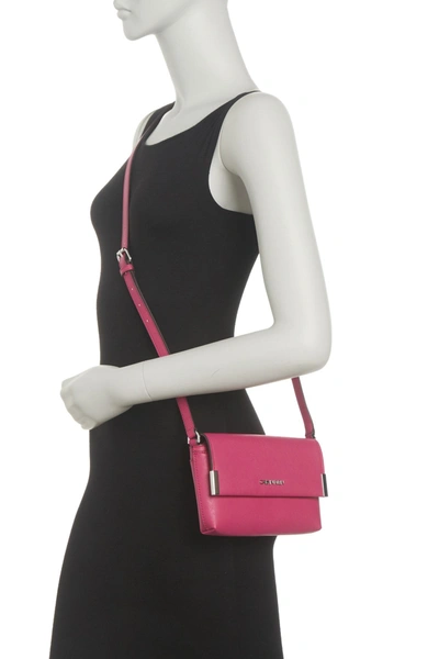 Shop Calvin Klein Saffiano Flap Crossbody Bag In Rhubarb