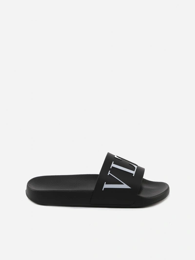 Shop Valentino Vltn Rubber Sandals In Black
