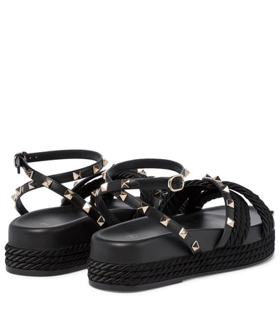Shop Valentino Rockstud Torchon Sandals In Black