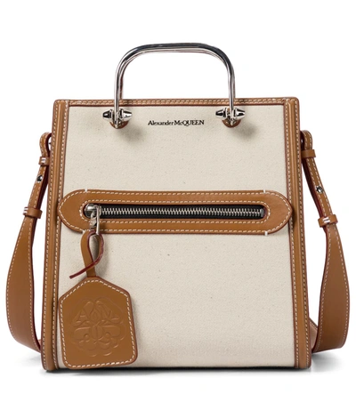 Shop Alexander Mcqueen The Short Story Leather-trimmed Tote In Beige