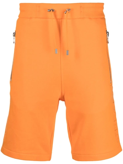 Shop Balmain Embossed-logo Shorts In Orange