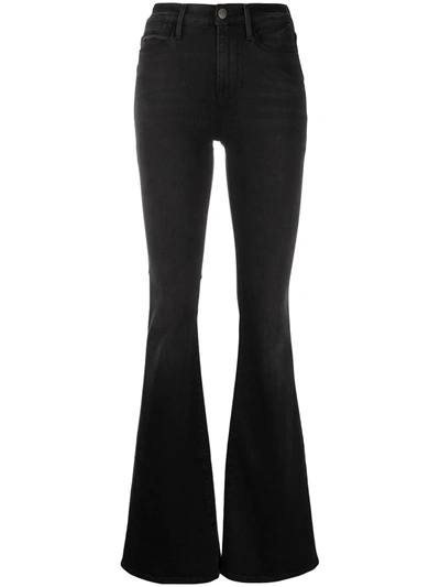 Shop Frame High Waisted Flared Jeans In Black