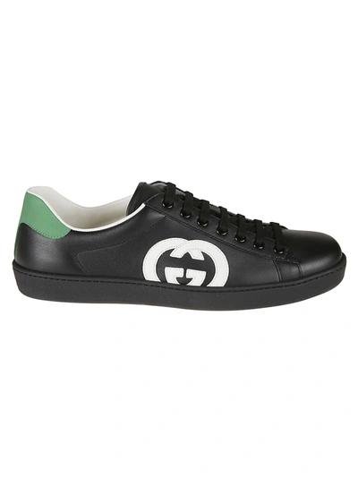 Shop Gucci Logo Embroidered Sneakers In Black/white