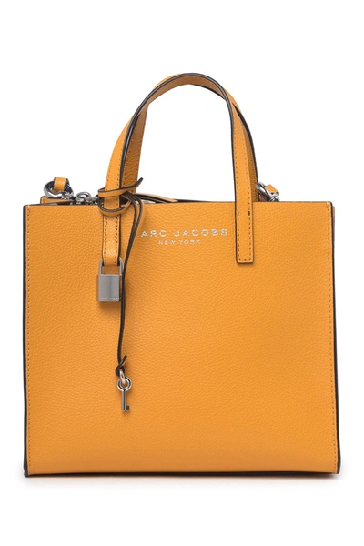 Shop Marc Jacobs Mini Grind Coated Leather Tote In Golden Poppy