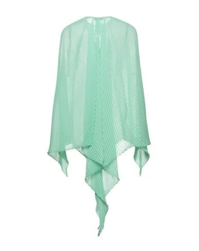 Shop Jw Anderson Capes & Ponchos In Green