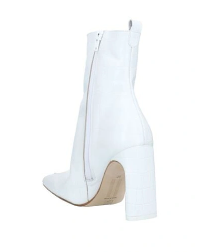 Shop Miista Ankle Boots In White