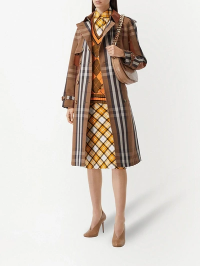 Shop Burberry Belted Check Trench Coat In Brown